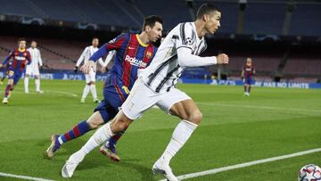 Soccer Football - Champions League - Group G - FC Barcelona v Juventus - Camp Nou, Barcelona, Spain - December 8, 2020 FC Barcelona&#039;s Lionel Messi in action with Juventus&#039; Cristiano Ronaldo REUTERS/Albert Gea