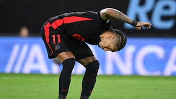 Barcelona's Brazilian forward #11 Raphinha reacts at the end of the Spanish league football match between RC Celta de Vigo and FC Barcelona at the Balaidos stadium in Vigo on November 23, 2024. The match ended in a draw 2-2. (Photo by MIGUEL RIOPA / AFP)