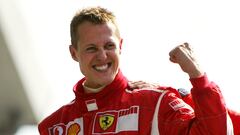 (FILES) In this file photo taken on September 10, 2006, German Ferrari driver Michael Schumacher celebrates on the podium of the Monza racetrack after the Italian Formula One Grand prix, in Monza. (Photo by Patrick HERTZOG / AFP)