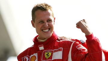 (FILES) In this file photo taken on September 10, 2006, German Ferrari driver Michael Schumacher celebrates on the podium of the Monza racetrack after the Italian Formula One Grand prix, in Monza. (Photo by Patrick HERTZOG / AFP)