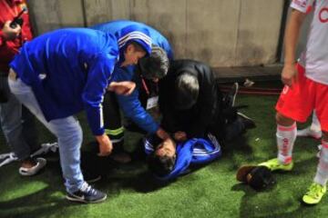 Hinchas de Universidad de Chile sufren un accidente durante el partido contra Audax Italiano por primera division en el Bicentenario de La Florida en septiembre pasado.  