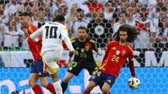 Soccer Football - Euro 2024 - Quarter Final - Spain v Germany - Stuttgart Arena, Stuttgart, Germany - July 5, 2024 Germany's Jamal Musiala shoots at goal and hits the arm of Spain's Marc Cucurella REUTERS/Lee Smith