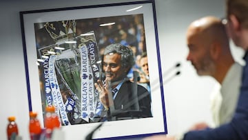 Beside a photo of Jose Mourinho, Chelsea's Italian head coach Enzo Maresca speaks at a press conference at Stamford Bridge in London on September 29, 2025, on the eve of their UEFA Champions League league phase football match against Benfica. (Photo by Adrian DENNIS / AFP)