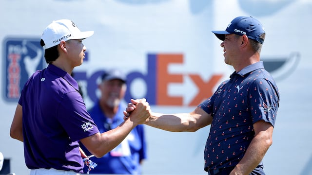 Mar 29, 2026; Houston, Texas, USA; Min Woo Lee shakes hands with Gary Woodland prior to teeing off on the first hole during the final round of the Texas Children's Houston Open golf tournament. Mandatory Credit: Erik Williams-Imagn Images