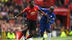 MANCHESTER, ENGLAND - APRIL 28:  Paul Pogba of Manchester United holds off N&#039;golo Kante of Chelsea during the Premier League match between Manchester United and Chelsea FC at Old Trafford on April 28, 2019 in Manchester, United Kingdom. (Photo by Sha