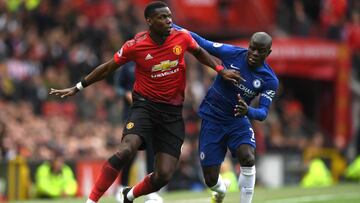 MANCHESTER, ENGLAND - APRIL 28: Paul Pogba of Manchester United holds off N'golo Kante of Chelsea during the Premier League match between Manchester United and Chelsea FC at Old Trafford on April 28, 2019 in Manchester, United Kingdom. (Photo by Sha