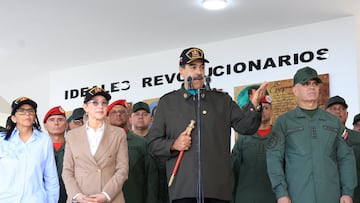 Venezuela’s President Nicolas Maduro, his wife Cilia Flores, Defence Minister Vladimir Padrino Lopez and Vice President Delcy Rodriguez attend a year-end salutation to military forces in La Guaira, Venezuela December 28, 2025. Miraflores Palace/Handout via REUTERS ATTENTION EDITORS - THIS IMAGE HAS BEEN SUPPLIED BY A THIRD PARTY.