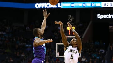 Nov 26, 2018; Charlotte, NC, USA; Milwaukee Bucks guard Eric Bledsoe (6) shoots the ball against Charlotte Hornets guard Kemba Walker (15) in the second half at Spectrum Center. Mandatory Credit: Jeremy Brevard-USA TODAY Sports