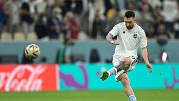 Argentina's forward #10 Lionel Messi warms up ahead of the Qatar 2022 World Cup football semi-final match between Argentina and Croatia at Lusail Stadium in Lusail, north of Doha on December 13, 2022.