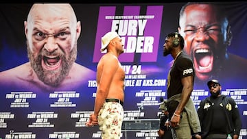 Los boxeadores Tyson Fury (izquierda) y Deontay Wilder (derecha) en la presentación de la pelea.