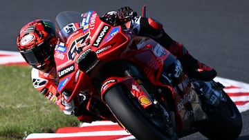 Ducati Lenovo Team's Italian MotoGP rider Francesco Bagnaia rides during a practice session during the Japanese MotoGP Grand Prix at Mobility Resort Motegi in Motegi, Tochigi prefecture on September 26, 2025. (Photo by TOSHIFUMI KITAMURA / AFP)
