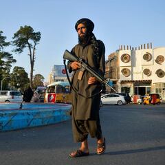 Why are Afghan women judges in hiding in Afghanistan and how are they being protected?