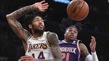 Dec 2, 2018; Los Angeles, CA, USA; Los Angeles Lakers forward Brandon Ingram (14) is fouled by Phoenix Suns guard Jamal Crawford (11) as he drives to the basket during the third quarter at Staples Center. Mandatory Credit: Robert Hanashiro-USA TODAY Sports