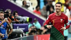 Portugal's forward #07 Cristiano Ronaldo smiles during the Qatar 2022 World Cup round of 16 football match between Portugal and Switzerland at Lusail Stadium in Lusail, north of Doha on December 6, 2022. (Photo by Jewel SAMAD / AFP)