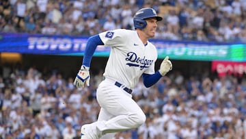 Oct 11, 2024; Los Angeles, California, USA; Los Angeles Dodgers first baseman Freddie Freeman (5) runs after hitting a single in the first inning during game five of the NLDS for the 2024 MLB Playoffs at Dodger Stadium. Mandatory Credit: Jayne Kamin-Oncea-Imagn Images