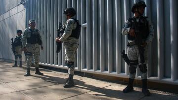 MEXICO CITY, MEXICO â JANUARY 5: Federal forces take security measures outside the Special Prosecutor's Office before the departure of a convoy carrying Ovidio Guzman, the son of renowned drug trafficker Joaquin 'El Chapo' Guzman to Altiplano prison in Mexico City, Mexico on January 5, 2023. (Photo by Silvana Flores/Anadolu Agency via Getty Images)