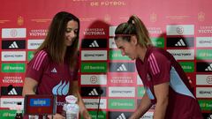 Spain's midfielder Aitana Bonmati (L) and Spain's forward Mariona Caldentey leave after a press conference in Cordoba on September 25, 2023, on the eve of their UEFA Women Nations League football matches against Switzerland. (Photo by CRISTINA QUICLER / AFP)