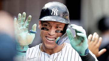 NEW YORK, NEW YORK - AUGUST 25: Aaron Judge #99 of the New York Yankees celebrates his seventh inning home run against the Colorado Rockies in the dugout with his teammates at Yankee Stadium on August 25, 2024 in New York City. Jim McIsaac/Getty Images/AFP (Photo by Jim McIsaac / GETTY IMAGES NORTH AMERICA / Getty Images via AFP)