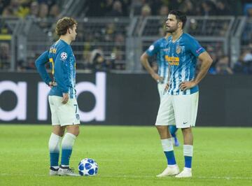 Antoine Griezmann (left) and Diego Costa are a picture of dejection as Atlético Madrid go down 4-0 away to Borussia Dortmund.