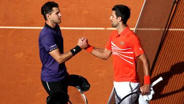 Tennis - ATP 1000 - Madrid Open - The Caja Magica, Madrid, Spain - May 11, 2019 Serbia's Novak Djokovic shakes hands with Austria's Dominic Thiem after their semi final match REUTERS/Sergio Perez