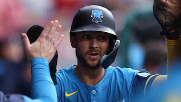 Apr 4, 2025; Philadelphia, Pennsylvania, USA; Philadelphia Phillies shortstop Trea Turner (7) celebrates in the dugout after scoring against the Los Angeles Dodgers during the first inning at Citizens Bank Park. Mandatory Credit: Bill Streicher-Imagn Images