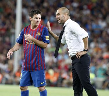 Leo Messi y Pep Guardiola.