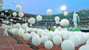 Balloons are let off into the sky as a giant inflatable figure is pulled across the King Baudouin Stadium during the opening ceremony for the Euro 2000 soccer championships in Brussels, Belgium, Saturday, June 10, 2000. (AP Photo/Murad Sezer) INAGURACION 