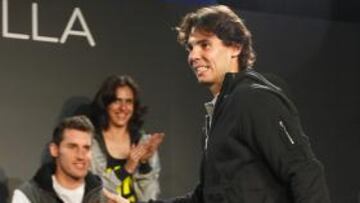 <b>EN MADRID. </b>Nadal , aplaudido por Rudy Fernández y Nuria Fernández.