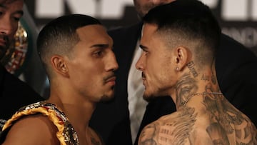 NEW YORK, NY - NOVEMBER 26: Teofimo Lopez, left, and George Kambosos face off during their weigh-in on November 26, 2021 in New York, New York.   Adam Hunger/Getty Images/AFP
 == FOR NEWSPAPERS, INTERNET, TELCOS &amp; TELEVISION USE ONLY ==