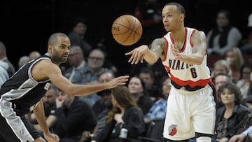 Apr 10, 2017; Portland, OR, USA; Portland Trail Blazers guard Shabazz Napier (6) passes the ball on San Antonio Spurs guard Tony Parker (9) during the first half of the game at Moda Center. Mandatory Credit: Steve Dykes-USA TODAY Sports