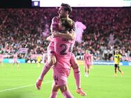 Inter Miami's Argentine forward #10 Lionel Messi celebrates scoring his second goal with Argentine midfielder #24 Mateo Silvetti during the Major League Soccer (MLS) playoff football match between Inter Miami and Nashville SC at Chase Stadium in Fort Lauderdale, Florida on November 8, 2025. (Photo by CHANDAN KHANNA / AFP)