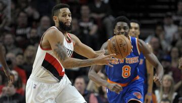Mar 23, 2017; Portland, OR, USA; Portland Trail Blazers guard Allen Crabbe (23) steals the ball in front of New York Knicks guard Justin Holiday (8) during the second half of the game at the Moda Center. The Blazers won the game 110-95. Mandatory Credit: Steve Dykes-USA TODAY Sports