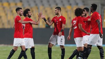 Soccer Football - International Friendly - Egypt v Guinea - Borg El Arab, Alexandria, Egypt - June 16, 2019  Egypt&#039;s Mohamed Salah and Baher El Mohamady celebrate after the match        REUTERS/Amr Abdallah Dalsh