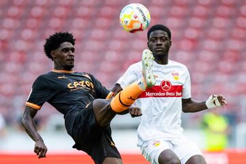 23 July 2022, Baden-Wuerttemberg, Stuttgart: Soccer: Test matches, VfB Stuttgart - FC Valencia at Mercedes-Benz Arena. Valencia's Thierry Correia (l) in action against Stuttgart's Clinton Mola (r). Photo: Tom Weller/dpa - IMPORTANT NOTE: In accordance with the requirements of the DFL Deutsche Fußball Liga and the DFB Deutscher Fußball-Bund, it is prohibited to use or have used photographs taken in the stadium and/or of the match in the form of sequence pictures and/or video-like photo series. (Photo by Tom Weller/picture alliance via Getty Images)