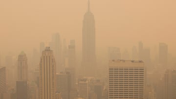 A view from the top of the Rockefeller Center, as haze and smoke caused by wildfires in Canada hang over the Manhattan skyline, in New York City, New York, U.S., June 7, 2023. REUTERS/Andrew Kelly