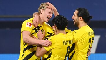 Soccer Football - Bundesliga - Schalke 04 v Borussia Dortmund - Veltins-Arena, Gelsenkirchen, Germany - February 20, 2021 Borussia Dortmund's Erling Braut Haaland celebrates scoring their second goal with teammates Pool via REUTERS/Ina Fassbender DFL