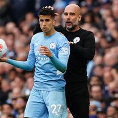 Cancelo stuck in the middle of Xavi and Guardiola