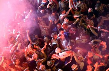 Croatia's supporters celebrate after winning the Russia 2018 World Cup semi-final football match between Croatia and England, at the main square in Zagreb on July 11, 2018