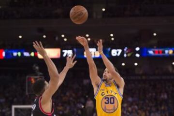 Stephen Curry y Cory Joseph.