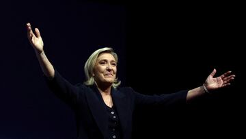 FILE PHOTO: Marine Le Pen, French far-right leader and far-right Rassemblement National (National Rally - RN) party candidate, reacts on stage after partial results in the first round of the early French parliamentary elections in Henin-Beaumont, France, June 30, 2024. REUTERS/Yves Herman/File Photo