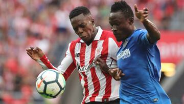 GRA314. BILBAO, 21/01/2016.- El delantero del Athletic Club I&ntilde;aki Williams (i) disputa un bal&oacute;n con el defensa del Getafe Djene Dakonam (d) durante el partido correspondiente a la primera jornada de LaLiga Santander que se disputa en el estadio de San Mam&eacute;s. EFE/Luis Tejido