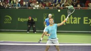 Rafa Nadal, durante su partido de dobles con Juan M&oacute;naco de pareja.