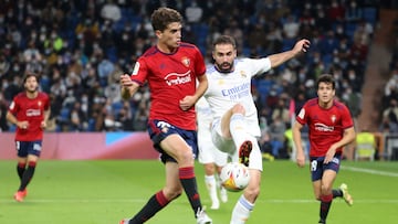 Soccer Football - LaLiga - Real Madrid v Osasuna - Santiago Bernabeu, Madrid, Spain - October 27, 2021 Real Madrid's Dani Carvajal in action with Osasuna's Javi Martinez REUTERS/Juan Medina