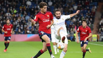 Soccer Football - LaLiga - Real Madrid v Osasuna - Santiago Bernabeu, Madrid, Spain - October 27, 2021 Real Madrid&#039;s Dani Carvajal in action with Osasuna&#039;s Javi Martinez REUTERS/Juan Medina