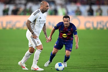 Raul Bravo y Ludovic Giuly.