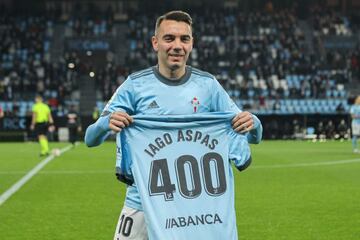 Iago Aspas of Celta de Vigo receives a shirt as a tribute for his 400 games with Celta de Vigo during La liga football match played between Celta de Vigo and CA Osasuna at Balaidos stadium on January 19, 2022, in Vigo, Pontevedra, Spain.