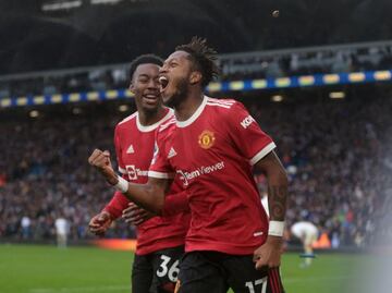 Soccer Football - Premier League - Leeds United v Manchester United - Elland Road, Leeds, Britain - February 20, 2022 Manchester United's Fred celebrates scoring their third goal with Anthony Elanga Action Images via Reuters/Lee Smith