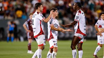Aug 3, 2025; Commerce City, CO, USA; Club Tijuana defender Unai Bilbao (4) and defender Pablo Ortiz (33) and defender Jackson Porozo (12) celebrate after the match against the Colorado Rapids at DICK'S Sporting Goods Park. Mandatory Credit: Isaiah J. Downing-Imagn Images