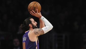 February 10, 2020; Los Angeles, California, USA; Phoenix Suns guard Ricky Rubio (11) shoots a three point basket against the Los Angeles Lakers during the first half at Staples Center. Mandatory Credit: Gary A. Vasquez-USA TODAY Sports