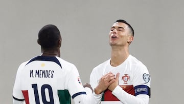 Soccer Football - UEFA Euro 2024 Qualifiers - Group J - Luxembourg v Portugal - Luxembourg Stadium, Luxembourg City, Luxembourg - March 26, 2023 Portugal's Cristiano Ronaldo celebrates scoring their first goal with Nuno Mendes REUTERS/Piroschka Van De Wouw